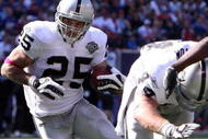 EAST RUTHERFORD, NJ - OCTOBER 11: Justin Fargas #25 of the Oakland Raiders rns the ball against the New York Giants on October 11, 2009 at Giants Stadium in East Rutherford, New Jersey. (Photo by Jim McIsaac/Getty Images)