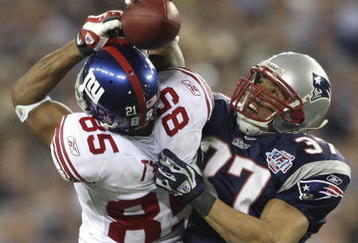 GLENDALE, AZ - FEBRUARY 03:  David Tyree #85 of the New York Giants catches a 32-yard pass from Eli Manning #10 as Rodney Harrison #37 of the New England Patriots attempts to knock it out in the fourth quarter of Super Bowl XLII on February 3, 2008 at the University of Phoenix Stadium in Glendale, Arizona.  (Photo by Andy Lyons/Getty Images)