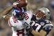GLENDALE, AZ - FEBRUARY 03: David Tyree #85 of the New York Giants catches a 32-yard pass from Eli Manning #10 as Rodney Harrison #37 of the New England Patriots attempts to knock it out in the fourth quarter of Super Bowl XLII on February 3, 2008 at the University of Phoenix Stadium in Glendale, Arizona. (Photo by Andy Lyons/Getty Images)