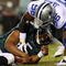PHILADELPHIA - DECEMBER 28:  Bradie James #56 of the Dallas Cowboys sacks Donovan McNabb #5 of the Philadelphia Eagles on December 28, 2008 at Lincoln Financial Field in Philadelphia, Pennsylvania.  (Photo by Jim McIsaac/Getty Images)