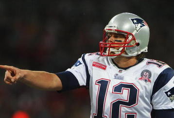 LONDON, ENGLAND - OCTOBER 25:  Tom Brady (#12) of the New England Patriots directs the play during the NFL International Series match between New England Patriots and Tampa Bay Buccaneers at Wembley Stadium on October 25, 2009 in London, England. This is the third occasion where a regular season NFL match has been played in London.  (Photo by Tom Shaw/Getty Images)