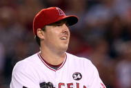 ANAHEIM, CA - OCTOBER 22:  John Lackey #41 of the Los Angeles Angels of Anaheim reacts in Game Five of the ALCS against the New York Yankees during the 2009 MLB Playoffs at Angel Stadium on October 22, 2009 in Anaheim, California.  (Photo by Stephen Dunn/Getty Images)