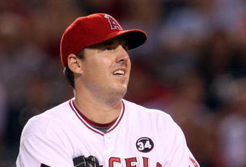 ANAHEIM, CA - OCTOBER 22:  John Lackey #41 of the Los Angeles Angels of Anaheim reacts in Game Five of the ALCS against the New York Yankees during the 2009 MLB Playoffs at Angel Stadium on October 22, 2009 in Anaheim, California.  (Photo by Stephen Dunn/Getty Images)