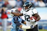 NASHVILLE, TN - NOVEMBER 01:  Maurice Jones-Drew #32 of the Jacksonville Jaguars breaks away from Vincent Fuller #22 of the Tennessee Titans during their game at LP Field on November 1, 2009 in Nashville, Tennessee.  (Photo by Streeter Lecka/Getty Images)