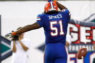 JACKSONVILLE, FL - OCTOBER 31:  Brandon Spikes #51 of the Florida Gators tosses the ball after intercepting a pass for a touchdown against the Georgia Bulldogs at Jacksonville Municipal Stadium on October 31, 2009 in Jacksonville, Florida.  (Photo by Kevin C. Cox/Getty Images)