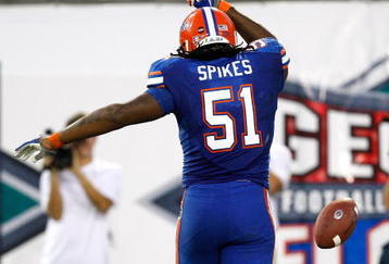 JACKSONVILLE, FL - OCTOBER 31:  Brandon Spikes #51 of the Florida Gators tosses the ball after intercepting a pass for a touchdown against the Georgia Bulldogs at Jacksonville Municipal Stadium on October 31, 2009 in Jacksonville, Florida.  (Photo by Kevin C. Cox/Getty Images)