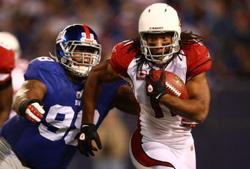 EAST RUTHERFORD, NJ - OCTOBER 25:  Larry Fitzgerald #11 of the Arizona Cardinals breaks away from Hakeem Nicks #88 of the New York Giants on October 25, 2009 at Giants Stadium in East Rutherford, New Jersey.  (Photo by Chris McGrath/Getty Images)