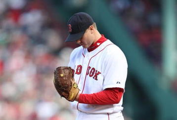 BOSTON - OCTOBER 11:  Pitcher Jonathan Papelbon #58 of the Boston Red Sox prepares to pitch against the Los Angeles Angels of Anaheim in the eighth inning of Game Three of the ALDS during the 2009 MLB Playoffs at Fenway Park on October 11, 2009 in Boston, Massachusetts. (Photo by Elsa/Getty Images)