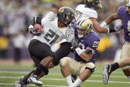SEATTLE - OCTOBER 24: LaMichael James #21 of the Oregon Ducks carries the ball against Nate Fellner #29 of the Washington Huskies on October 24, 2009 at Husky Stadium in Seattle, Washington. The Ducks defeated the Huskies 43-19. (Photo by Otto Greule Jr/Getty Images)