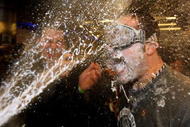 NEW YORK - NOVEMBER 04: Nick Swisher #33 of the New York Yankees celebrates in the locker room after thei r7-3 win against the Philadelphia Phillies in Game Six of the 2009 MLB World Series at Yankee Stadium on November 4, 2009 in the Bronx borough of New York City. (Photo by Nick Laham/Getty Images)