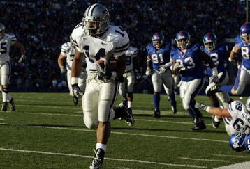 LAWRENCE, KS - NOVEMBER 18:  Running back Leon Patton #14 of the Kansas State Wildcats breaks free for a touchdown against the Kansas Jayhawks in the second quarter at Memorial Stadium November 18, 2006 in Lawrence, Kansas.  (Photo by Brian Bahr/Getty Images)