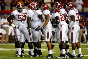 ATLANTA - SEPTEMBER 05:  The Alabama Crimson Tide defense against the Virginia Tech Hokies during the Chick-fil-A Kickoff Game at Georgia Dome on September 5, 2009 in Atlanta, Georgia.  (Photo by Kevin C. Cox/Getty Images)