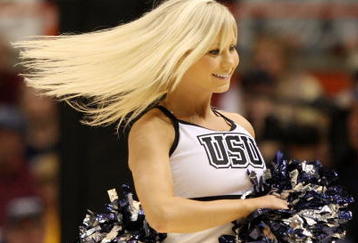 BOISE, ID - MARCH 20:  Cheerleaders for the Utah State Aggies dance during the game against the Marquette Golden Eagles in the first round of the NCAA Division I Men's Basketball Tournament at the Taco Bell Arena on March 20, 2009 in Boise, Idaho.  (Photo by Jed Jacobsohn/Getty Images)