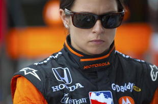 SPARTA, KY - JULY 31: Danica Patrick driver of the #7 Boost Mobile/Motorola Andretti Green Racing Dallara Honda during a delay in practice for the IRL IndyCar Series Meijer Indy 300 on July 31, 2009 at the Kentucky Speedway in Sparta, Kentucky. (Photo by Robert Laberge/Getty Images)