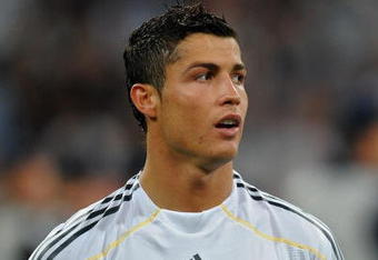 MADRID, SPAIN - SEPTEMBER 30:  Cristiano Ronaldo of Real Madrid looks on prior to the Champions League group C match between Real Madrid and Marseille at the Estadio Santiago Bernabeu on September 30, 2009 in Madrid, Spain. Real Madrid won the match 3-0.  (Photo by Jasper Juinen/Getty Images)