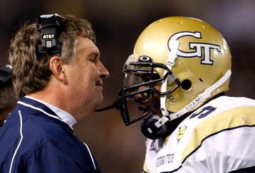 ATLANTA - OCTOBER 17:  Head coach Paul Johnson (L) of the Georgia Tech Yellow Jackets congratulates quarterback Josh Nesbitt #9 after his touchdown against the Virginia Tech Hokies at Bobby Dodd Stadium on October 17, 2009 in Atlanta, Georgia.  (Photo by Kevin C. Cox/Getty Images)