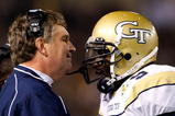 ATLANTA - OCTOBER 17:  Head coach Paul Johnson (L) of the Georgia Tech Yellow Jackets congratulates quarterback Josh Nesbitt #9 after his touchdown against the Virginia Tech Hokies at Bobby Dodd Stadium on October 17, 2009 in Atlanta, Georgia.  (Photo by Kevin C. Cox/Getty Images)