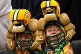 GREEN BAY, WI - OCTOBER 19:  Two Packers fans watch the game between the Indianapolis Colts and the Green Bay Packers on October 19, 2008 at Lambeau Field in Green Bay Wisconsin. The Packers won 34-14.   (Photo by Stephen Dunn/Getty Images)