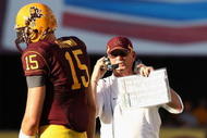 TEMPE, AZ - OCTOBER 03:  Head coach Dennis Erickson talks with quarterback Danny Sullivan #15 of the Arizona State Sun Devils during the college football game against the Oregon State Beavers at Sun Devil Stadium on October 3, 2009 in Tempe, Arizona. The Beavers defeated the Sun Devils 28-17.  (Photo by Christian Petersen/Getty Images)