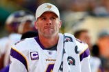 GREEN BAY, WI - NOVEMBER 01: Quarterback Brett Favre #4 of the Minnesota Vikings walks on the sidelines during the first quarter of the game against the Green Bay Packers at Lambeau Field on November 1, 2009 in Green Bay, Wisconsin. (Photo by Scott Boehm/Getty Images)