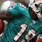 EAST RUTHERFORD, NJ - NOVEMBER 01:  Ted Ginn #19 of the Miami Dolphins returns a kick off during a game against the New York Jets at Giants Stadium on November 1, 2009 in East Rutherford, New Jersey.  (Photo by Chris Trotman/Getty Images)