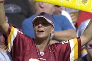 TAMPA, FL - NOVEMBER 25: A fan of the Washington Redskins cheers play against the Tampa Bay Buccaneers at the Raymond James Stadium on November 25, 2007 in Tampa, Florida.  The Bucs won 19-13. (Photo by Al Messerschmidt/Getty Images) *** Local Caption ***
