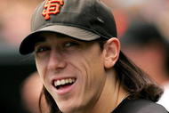 SAN FRANCISCO - AUGUST 30:  Tim Lincecum #55 of the San Francisco Giants stands in the dugout before their game against the Colorado Rockies at AT&T Park on August 30, 2009 in San Francisco, California.  (Photo by Ezra Shaw/Getty Images)