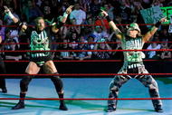 LAS VEGAS - AUGUST 24:  Wrestlers and tag team partners Triple H (L) and Shawn Michaels pose during the WWE Monday Night Raw show at the Thomas & Mack Center August 24, 2009 in Las Vegas, Nevada.  (Photo by Ethan Miller/Getty Images)