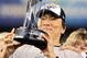 NEW YORK - NOVEMBER 04:  World Series MVP Hideki Matsui #55 of the New York Yankees celebrates with the MVP trophy after their 7-3 win against the Philadelphia Phillies in Game Six of the 2009 MLB World Series at Yankee Stadium on November 4, 2009 in the Bronx borough of New York City.  (Photo by Jed Jacobsohn/Getty Images)