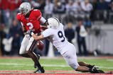 COLUMBUS, OH - OCTOBER 25: Quarterback Terrell Pryor #2 of the Ohio State Buckeyes fumbles the ball after being hit by defensive back Mark Rubin #9 of the Penn State Nittany Lions on October 25, 2008 at Ohio Stadium in Columbus, Ohio. Penn State recovered the ball and went on to score the game-winning touchdown. Penn State recovered the ball and went on to score the game-winning touchdown in their 13-6 victory over Ohio State. (Photo by Jamie Sabau/Getty Images)