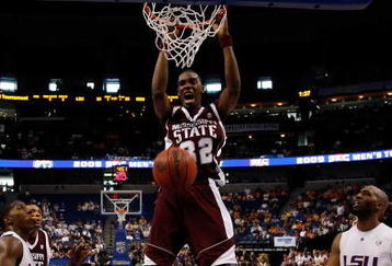 TAMPA, FL - MARCH 14:  Jarvis Varnado #32 of the Mississippi State Bulldogs dunks the ball around Quintin Thornton #32 of the Louisiana State University Tigers during the Semifinal round of the SEC Men's Basketball Tournament on March 14, 2009 at The St. Pete Times Forum in Tampa, Florida.  (Photo by Chris Graythen/Getty Images)
