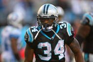 CHARLOTTE, NC - NOVEMBER 16:  DeAngelo Williams #34 of the Carolina Panthers looks on during their NFL game against the Detroit Lions at Bank of America Stadium on November 16, 2008  in Charlotte, North Carolina. The Panthers defeated the Lions 31-22. (Photo by Streeter Lecka/Getty Images)