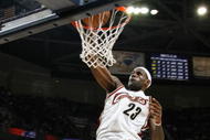 CLEVELAND - NOVEMBER 05:  LeBron James #23 of the Cleveland Cavaliers gets in for a dunk in front of Tyrus Thomas #24 of the Chicago Bulls on November 5, 2008 at the Quicken Loans Arena in Cleveland, Ohio. Cleveland won the game 107-93. NOTE TO USER: User expressly acknowledges and agrees that, by downloading and or using this photograph, User is consenting to the terms and conditions of the Getty Images License Agreement.  (Photo by Gregory Shamus/Getty Images)
