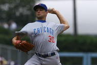 LOS ANGELES, CA - AUGUST 22: Ted Lilly #30 of the Chicago Cubs pitches against the Los Angeles Dodgers at Dodger Stadium on August 22, 2009 in Los Angeles, California. (Photo by Jeff Gross/Getty Images)