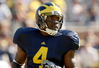 ANN ARBOR, MI - SEPTEMBER 19:  Running back Brandon Minor #4 of the Michigan Wolverines warms up for the game against the Eastern Michigan Eagles at Michigan Stadium on September 19, 2009 in Ann Arbor, Michigan.  Michigan won 45-17.  (Photo by Stephen Dunn/Getty Images)