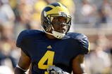 ANN ARBOR, MI - SEPTEMBER 19:  Running back Brandon Minor #4 of the Michigan Wolverines warms up for the game against the Eastern Michigan Eagles at Michigan Stadium on September 19, 2009 in Ann Arbor, Michigan.  Michigan won 45-17.  (Photo by Stephen Dunn/Getty Images)