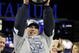 NEW YORK - NOVEMBER 4:  Manager Joe Girardi of the New York Yankees celebrates with the trophy after their 7-3 win against the Philadelphia Phillies in Game Six of the 2009 MLB World Series at Yankee Stadium on November 4, 2009 in the Bronx borough of New York City.  (Photo by David J. Phillip-Pool/Getty Images)