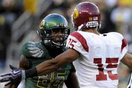EUGENE, OR - OCTOBER 31: Wide receiver Garrett Embry #86 of the Oregon Ducks gets in the face of cornerback Kevin Thomas #15 of the  USC Trojans during action in the first quarter of the game at Autzen Stadium on October 31, 2009 in Eugene, Oregon. Oregon defeated USC 47-20. (Photo by Steve Dykes/Getty Images)