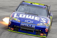 MARTINSVILLE, VA - OCTOBER 25:  Jimmie Johsnon drives the #48 Lowe's Chevrolet during the NASCAR Sprint Cup Series TUMS Fast Relief 500 at Martinsville Speedway on October 25, 2009 in Martinsville, Virginia.  (Photo by John Harrelson/Getty Images)