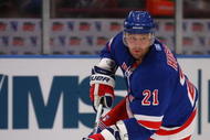 NEW YORK - SEPTEMBER 15: Chris Higgins #21 skates in his first game as a member of the New York Rangers against the Boston Bruins at Madison Square Garden on September 15, 2009 in New York, New York. (Photo by Bruce Bennett/Getty Images)