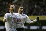 LONDON - FEBRUARY 25: Aaron Lennon of Tottenham Hotspur celebrates with Steed Malbranque of Tottenham Hotspur after Lennon scored during the Barclays Premiership match between and Tottenham Hotspur and Bolton Wanderers at White Hart Lane on February 25, 2007 London, England.  (Photo by Phil Cole/Getty Images)