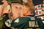 DALLAS - JANUARY 22:  Brett Hull of the 1999 Dallas Stars Stanley Cup team signs a mural during the 1999 Dallas Stars Stanley Cup Reunion at the American Airlines Center on January 22, 2007 in Dallas, Texas.  (Photo by Bruce Bennett/Getty Images)