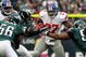 PHILADELPHIA - NOVEMBER 01: Brandon Jacobs #27 of the New York Giants is stopped on a run by the defense of the Philadelphia Eagles on November 1, 2009 at Lincoln Financial Field in Philadelphia, Pennsylvania. The Eagles defeated the Giants 40-17. (Photo by Jim McIsaac/Getty Images)