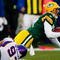 GREEN BAY, WI - NOVEMBER 01:  Quarterback Aaron Rodgers #12 of the Green Bay Packers is sacked by Kevin Williams #93 of the Minnesota Vikings during the second quarter of the game at Lambeau Field on November 1, 2009 in Green Bay, Wisconsin. (Photo by Scott Boehm/Getty Images)