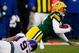 GREEN BAY, WI - NOVEMBER 01:  Quarterback Aaron Rodgers #12 of the Green Bay Packers is sacked by Kevin Williams #93 of the Minnesota Vikings during the second quarter of the game at Lambeau Field on November 1, 2009 in Green Bay, Wisconsin. (Photo by Scott Boehm/Getty Images)