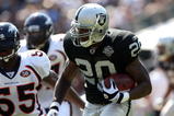 OAKLAND, CA - SEPTEMBER 27: Darren McFadden #20 of the Oakland Raiders runs against the Denver Broncos on September 27, 2009 during an NFL game at the Oakland-Alameda County Coliseum in Oakland, California.  (Photo by Jed Jacobsohn/Getty Images)