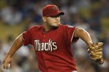 LOS ANGELES, CA - SEPTEMBER 01:  Yusmeiro Petit #48 of the Arizona Diamondbacks pitches against the Los Angeles Dodgers at Dodger Stadium on September 1, 2009 in Los Angeles, California.  (Photo by Jeff Gross/Getty Images)