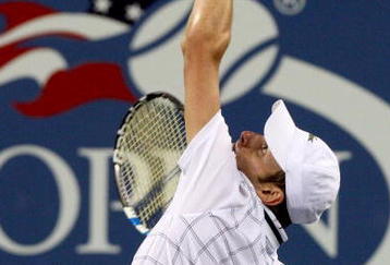 NEW YORK - SEPTEMBER 05:  Andy Roddick serves to John Isner during day six of the 2009 U.S. Open at the USTA Billie Jean King National Tennis Center on September 5, 2009 in the Flushing neighborhood of the Queens borough of New York City.  (Photo by Jim McIsaac/Getty Images)