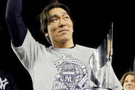 NEW YORK - NOVEMBER 4:  World Series MVP Hideki Matsui #55 of the New York Yankees celebrates with the MVP trophy after their 7-3 win against the Philadelphia Phillies in Game Six of the 2009 MLB World Series at Yankee Stadium on November 4, 2009 in the Bronx borough of New York City.  (Photo by David J. Phillip-Pool/Getty Images)