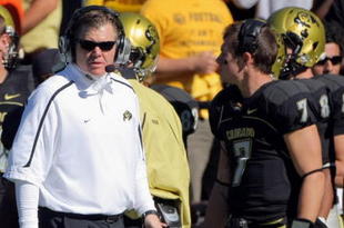 BOULDER, CO - OCTOBER 31: Head coach Dan Hawkins of the Colorado Buffaloes leads his team against the Missouri Tigers with his son Cody Hawkins #7 on the sidelines at Folsom Field on October 31, 2009 in Boulder, Colorado. Missouri defeated Colorado 36-17. (Photo by Doug Pensinger/Getty Images)